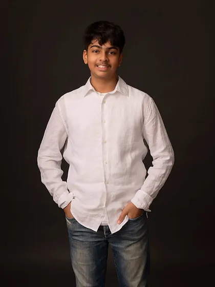 Another confident pose, showing how a simple studio session can produce a full gallery of classic, memorable portraits for older kids.