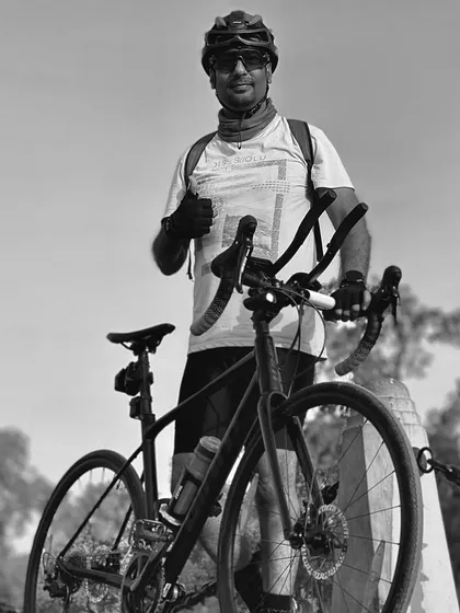 A black and white portrait of our photographer member. A stylish shot for a stylish guy.