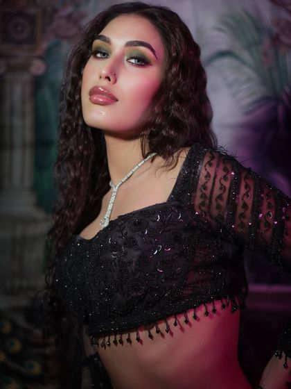 A close-up of the bold and fierce look, showing a hint of green on the eyes for a surprising twist.