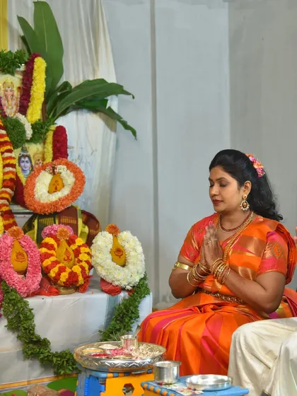 A quiet moment of prayer during a Gruha Pravesha (housewarming ceremony). I understand the importance of these traditions and focus on capturing the spiritual essence and family togetherness of the pooja with respect and attention to detail.