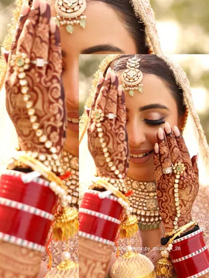 A close up of the beautiful stain on a bride's hands. The intricate patterns are so clear and the color is so rich, it really makes the wedding photos pop.