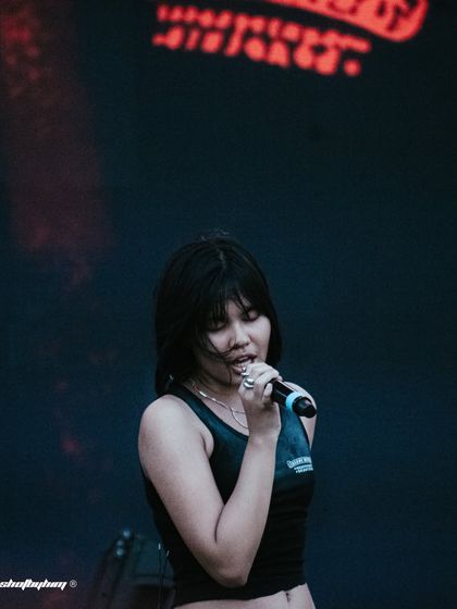 A quieter, more introspective shot of Kim the Beloved during her performance at Rolling Loud India.