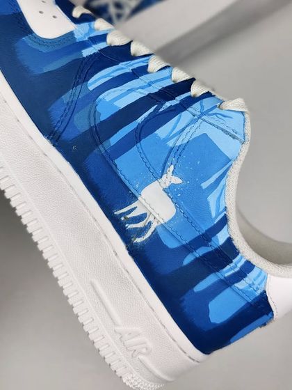 A detail shot of the Patronus design. The subtle layering of different shades of blue gives the forest scene depth and a magical feel.