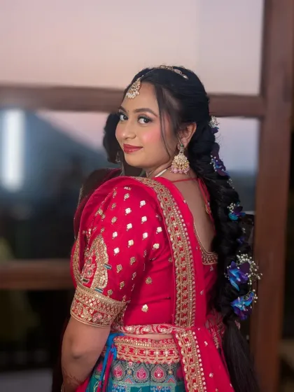 A close-up of the floral braid, showing how the flowers are carefully integrated into the hair for a seamless and beautiful finish.