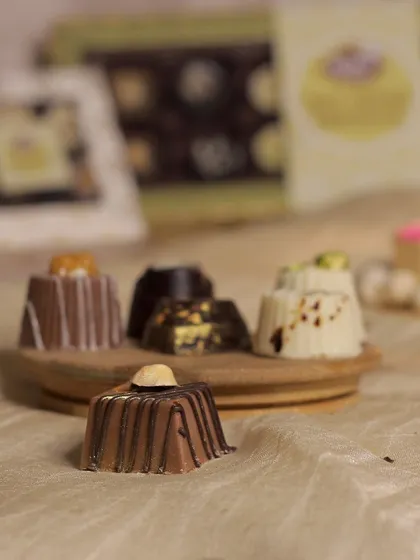 Our Hazelnut soft-center chocolate is a classic favorite, topped with a whole hazelnut.