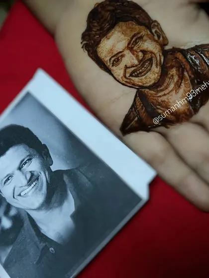 To show the precision of my portrait work, here is a henna tribute I created next to the original photograph. Capturing a likeness and an expression like this takes years of practice. It's a skill I pour my heart into.