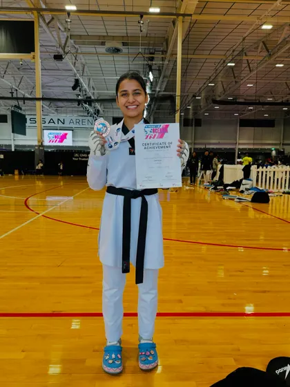 A full-length shot of Sonia Bhardwaj celebrating her Bronze medal win at the WT President's Cup.