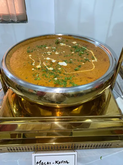 Soft, melt-in-your-mouth dumplings made of paneer and potato are served in a creamy and aromatic gravy in our Malai Kofta. This is a luxurious dish perfect for special occasions.