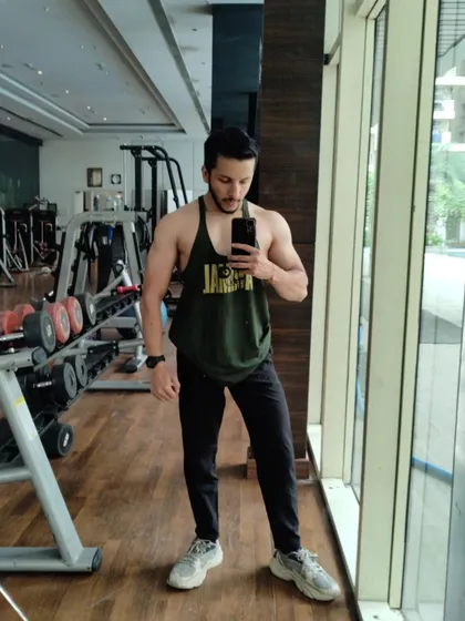 Taking a moment to appreciate the post-workout pump. It's a rewarding feeling after a hard session.