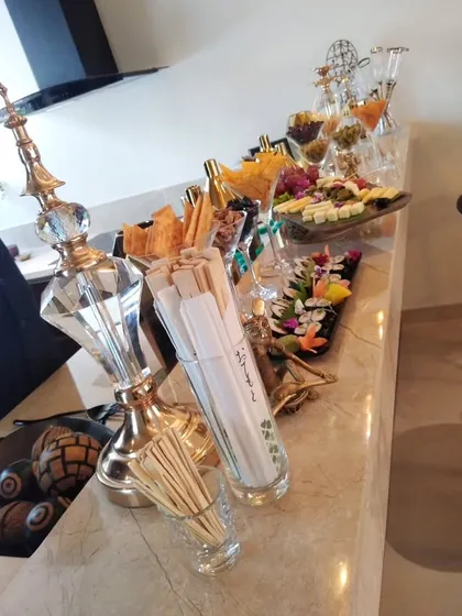 Another angle of the sophisticated appetizer station for a home event, showcasing our ability to create a high-end experience in an intimate setting.
