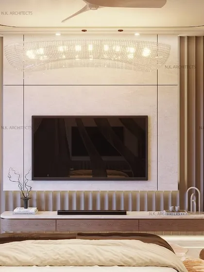 Drenched in tones of brown and beige, this bedroom is all about timeless luxury. The bed wall features a striking mix of mirror and marble curves, while the TV wall has soft, fluted details in a rich matte PU finish.