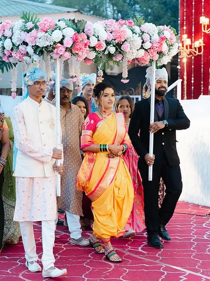 The bride's grand entrance, looking regal in her traditional attire.