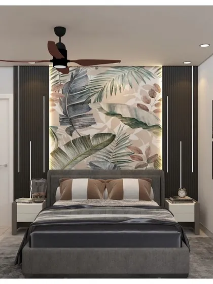 A frontal view of the tropical-themed bedroom concept. The statement wallpaper behind the bed is flanked by dark panels, creating a stunning and immersive focal point.