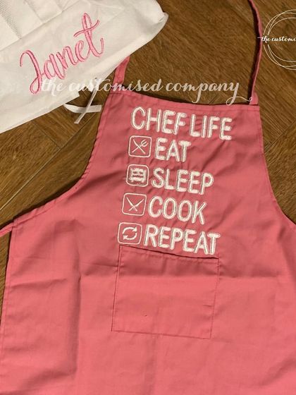 For the chef who lives the "Eat, Sleep, Cook, Repeat" lifestyle. This personalized pink apron and matching chef's hat are a fun and motivational gift for anyone who loves to cook.