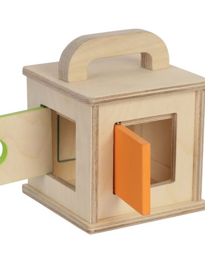 A wooden toy box with its doors open, showing the interior.