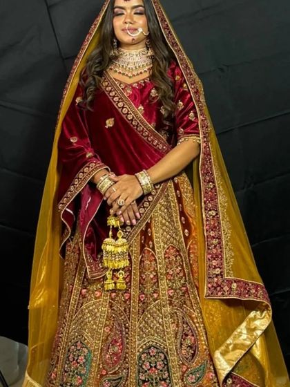 A full view of the stunning Rajwadi bridal lehenga on a mannequin, showcasing its rich colors and textures.