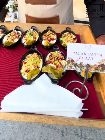 We elevate classic Indian street food with a modern twist. Our Palak Patta Chaat is served in individual portions, featuring crispy spinach leaves topped with yogurt, chutneys, and spices for a burst of flavor in every bite.