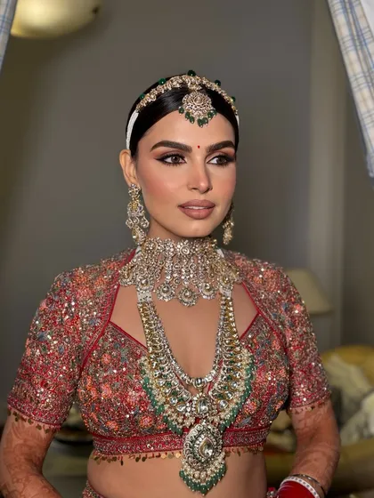 A close up of the makeup, showing the soft yet defined eye work and the perfectly sculpted skin. This is a classic bridal look that will never go out of style.