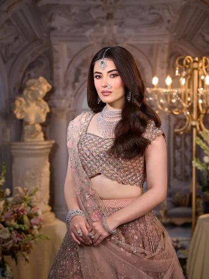 A stunning portrait of the modern bride. The makeup is soft, romantic, and perfectly suited for a grand, elegant setting.