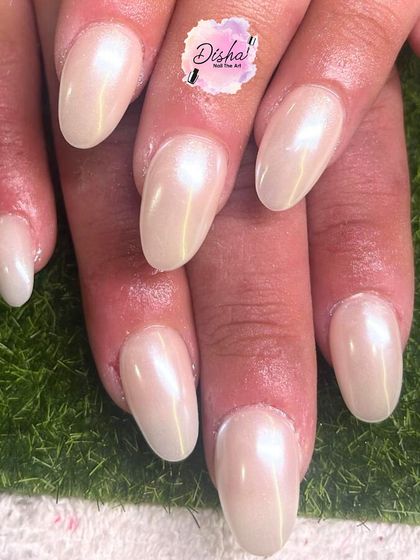 Simple and elegant. A beautiful set of pearlescent white nails, perfect for any occasion.