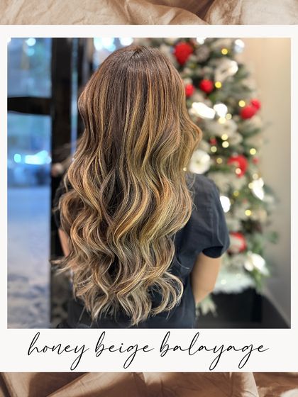 A festive Honey Beige Balayage, perfectly styled against a Christmas backdrop. The warm tones are perfect for the holiday season.