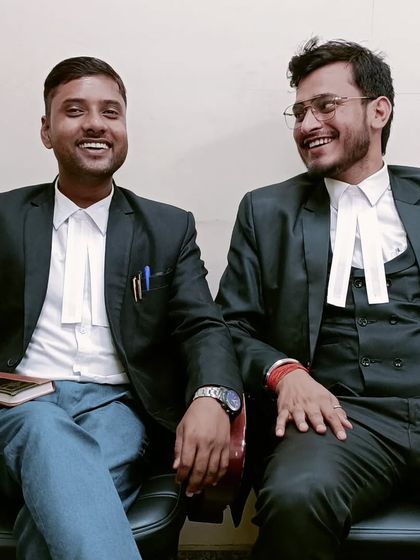 Sharing a laugh with a junior colleague. Mentoring the next generation of lawyers is part of my responsibility.