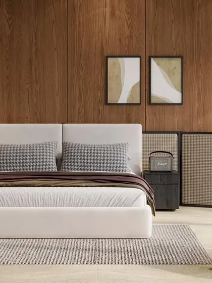 A bedroom should be a sanctuary. Here, I used a warm wood-paneled wall, soft neutral fabrics, and minimal furniture to create a calm, uncluttered retreat that feels both modern and deeply restful.