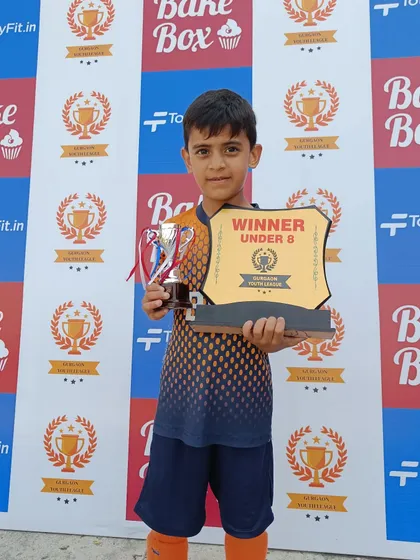 Yash Yadav, one of our rising stars, with his Under 8 winner's plaque. His never give up attitude is an inspiration.