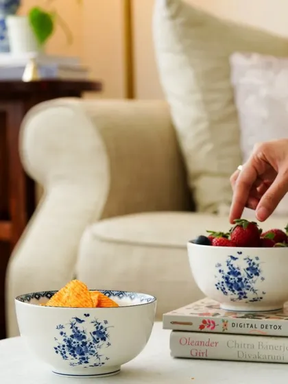 A lifestyle scene with ceramic bowls used for serving fruits and snacks, showing how the products fit into a comfortable home setting.