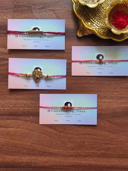 A flat lay of some of my premium handmade rakhis. These designs feature intricate centerpieces with Kundan and zardozi work.