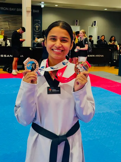 The smile of a champion. Sonia Bhardwaj with her hard-earned medals from the Australian circuit.
