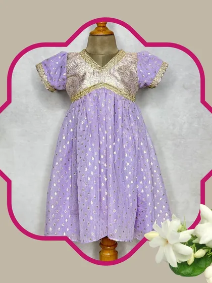 This lavender frock is another piece from our fusion collection, featuring a brocade bodice and a lightweight, sparkly skirt.