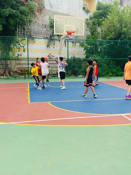 A player takes a jump shot.