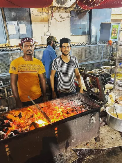 Our team at the sigdi, making sure the kebabs are grilled to perfection. They work tirelessly to serve you hot and tempting food all night long.
