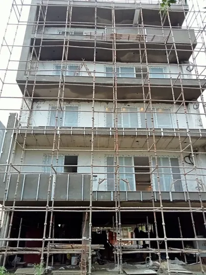 A residential project for a client in Sector 89, Faridabad, taking shape. This image shows the building's structure with plastering work underway.