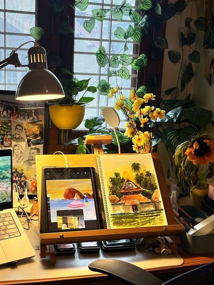 My happy place. This is my studio desk, filled with plants, art supplies, and ongoing projects. It's where my art meets my heart.