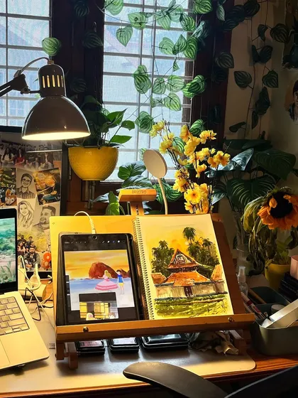 My happy place. This is my studio desk, filled with plants, art supplies, and ongoing projects. It's where my art meets my heart.