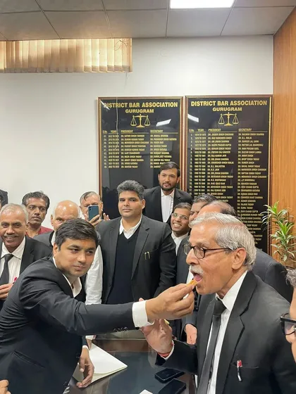 Sharing a moment of celebration with a senior member of the bar. His support means the world to me.