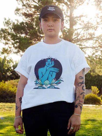 A model wearing the 'Water' element T-shirt from my 'Your Magic' merchandise collaboration.