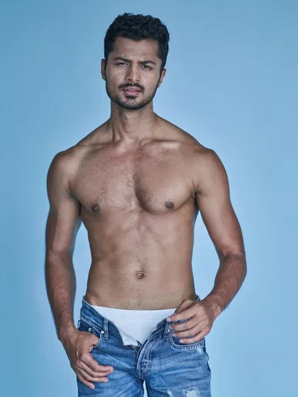 Stand firm, act with conviction, be strong. This pose captures a sense of strength and confidence for a fashion shoot.