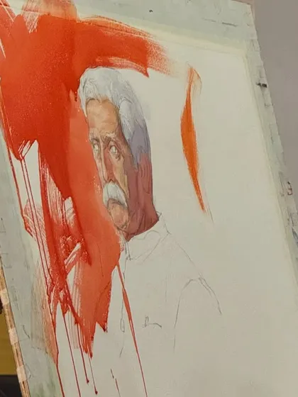 The portrait in progress, with bold washes of red creating a dynamic background. This technique helps to make the subject stand out.