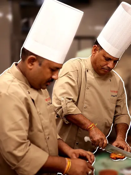A collage of our chefs in action, cutting and preparing ingredients with focus and expertise. This is where culinary excellence begins.