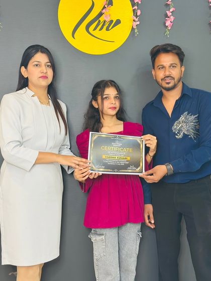 Awarding a certificate to a student at the successful completion of the Rajasthan masterclass.