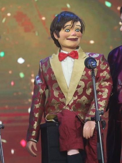 My parents, Ramdas and Aparna Padhye, on stage with their famous puppet character, Ardhavatrao. They have been performing together for decades.