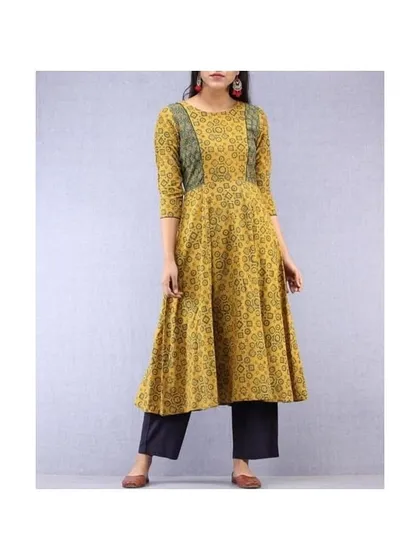 Anarkalis can also be perfect for casual wear. This mustard yellow printed Anarkali has a gentle flare and side panels in a contrasting fabric, offering a comfortable fit for daily activities.