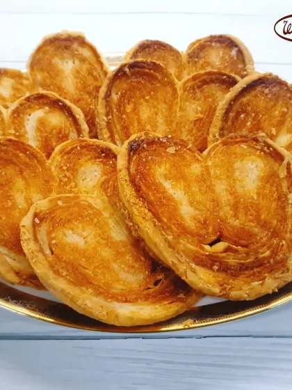 These are our original French Hearts, or Palmiers. Each one is a flaky, buttery, and perfectly caramelized puff pastry that has been a favourite for generations. It is a simple classic that tastes just like nostalgia.