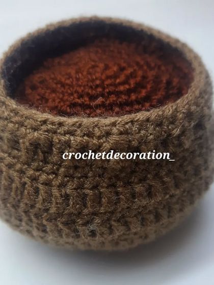 A close-up of one of our handmade crochet pots, showing the texture and sturdiness of the base we create for our floral arrangements.