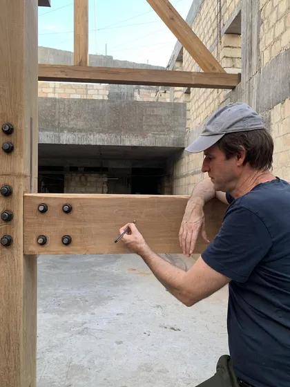 A member of our team signing off on a timber joinery mockup at the House of Galleries site. This hands-on involvement ensures quality and precision.