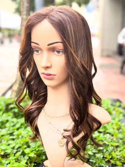 Our creamy blonde custom wig is another stunning option for a glamorous look. The color is rich and the waves are styled for a soft, romantic feel.