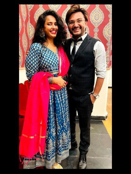 Posing with a friend. My flowy Anarkali is a great option for a wedding event, as it's easy to move and dance in while still looking incredibly elegant.